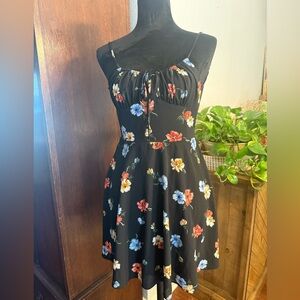 B. Smart Black Dress with Colorful Floral Design